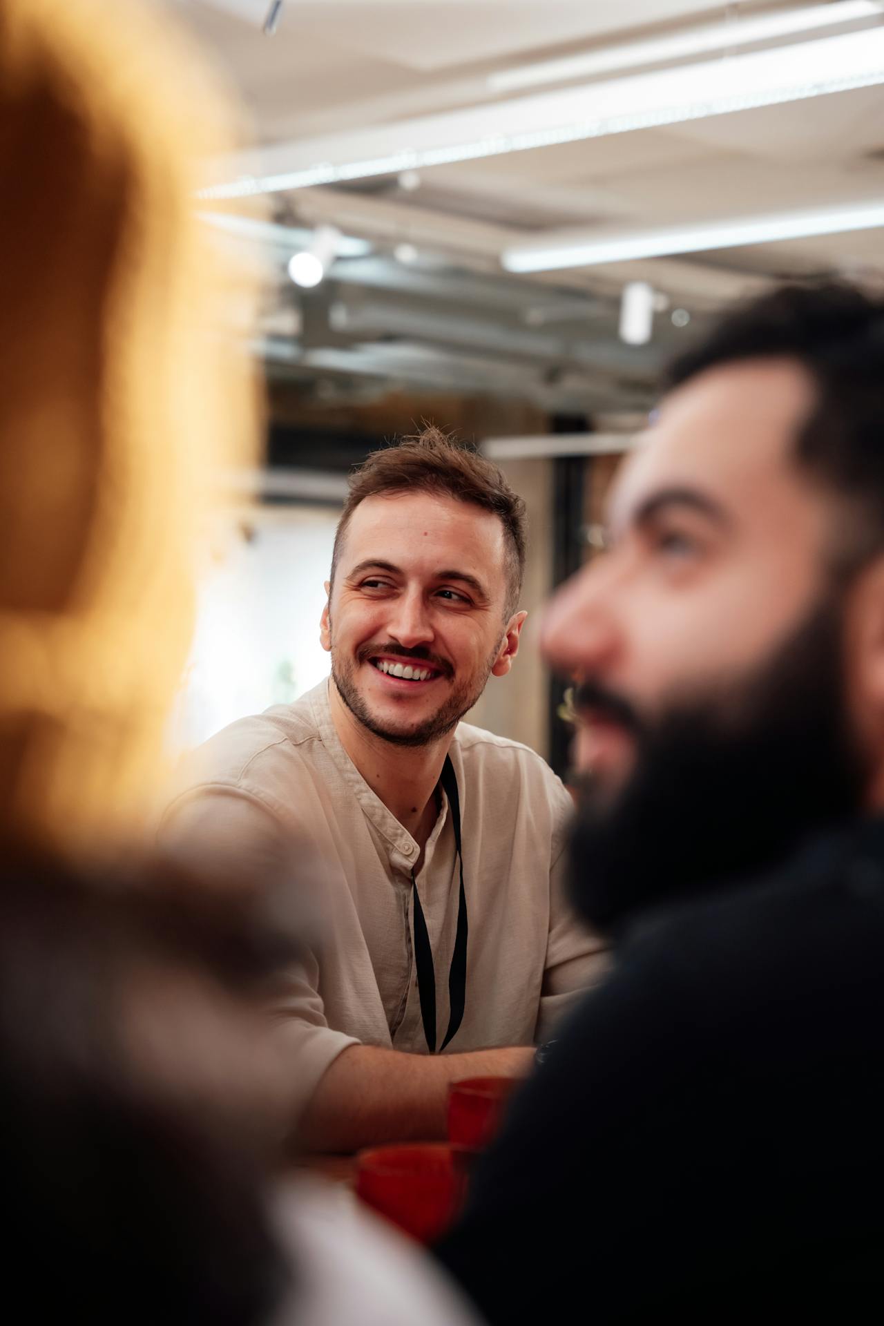 Clinician engaging warmly in a professional group setting