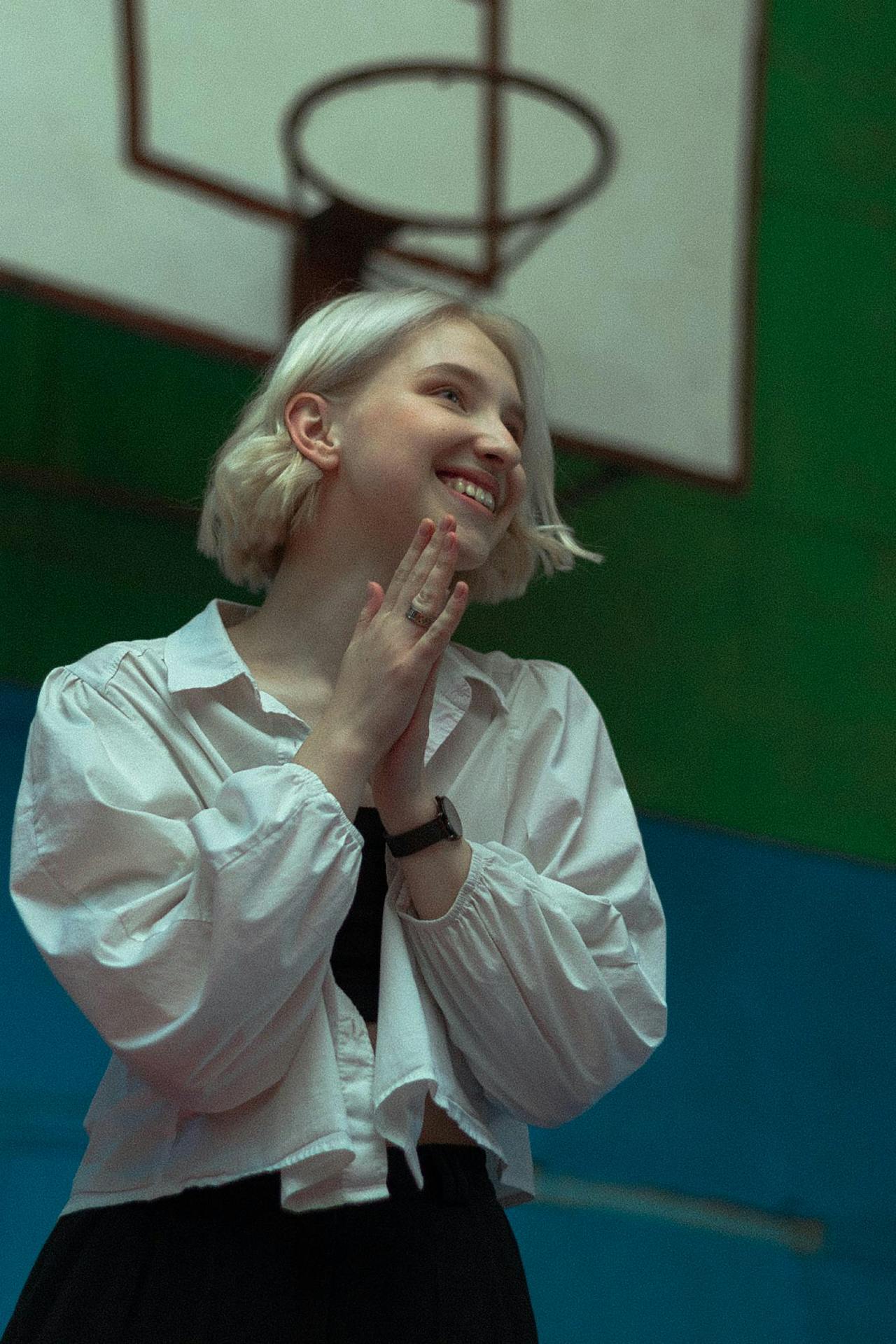 Person smiling with a sense of lightness and hope